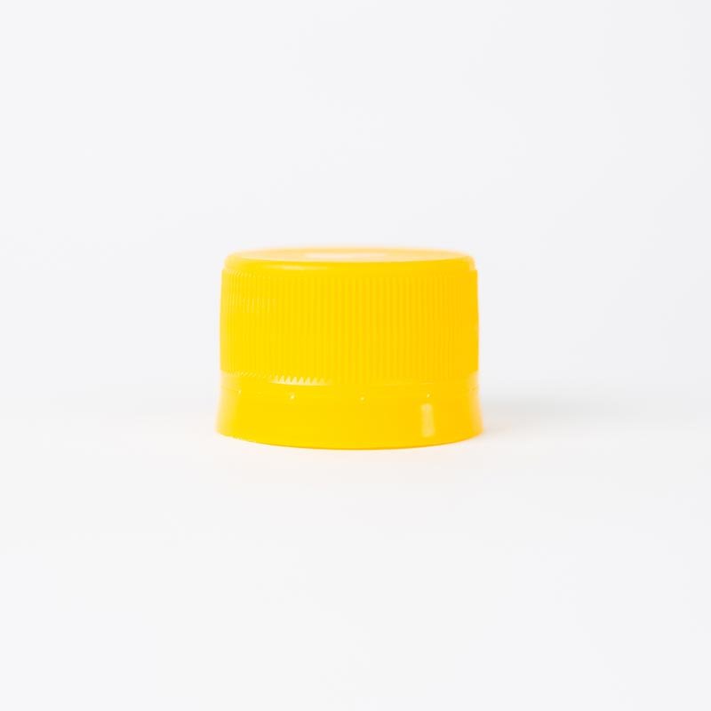 tapa amarilla para botellas plásticas